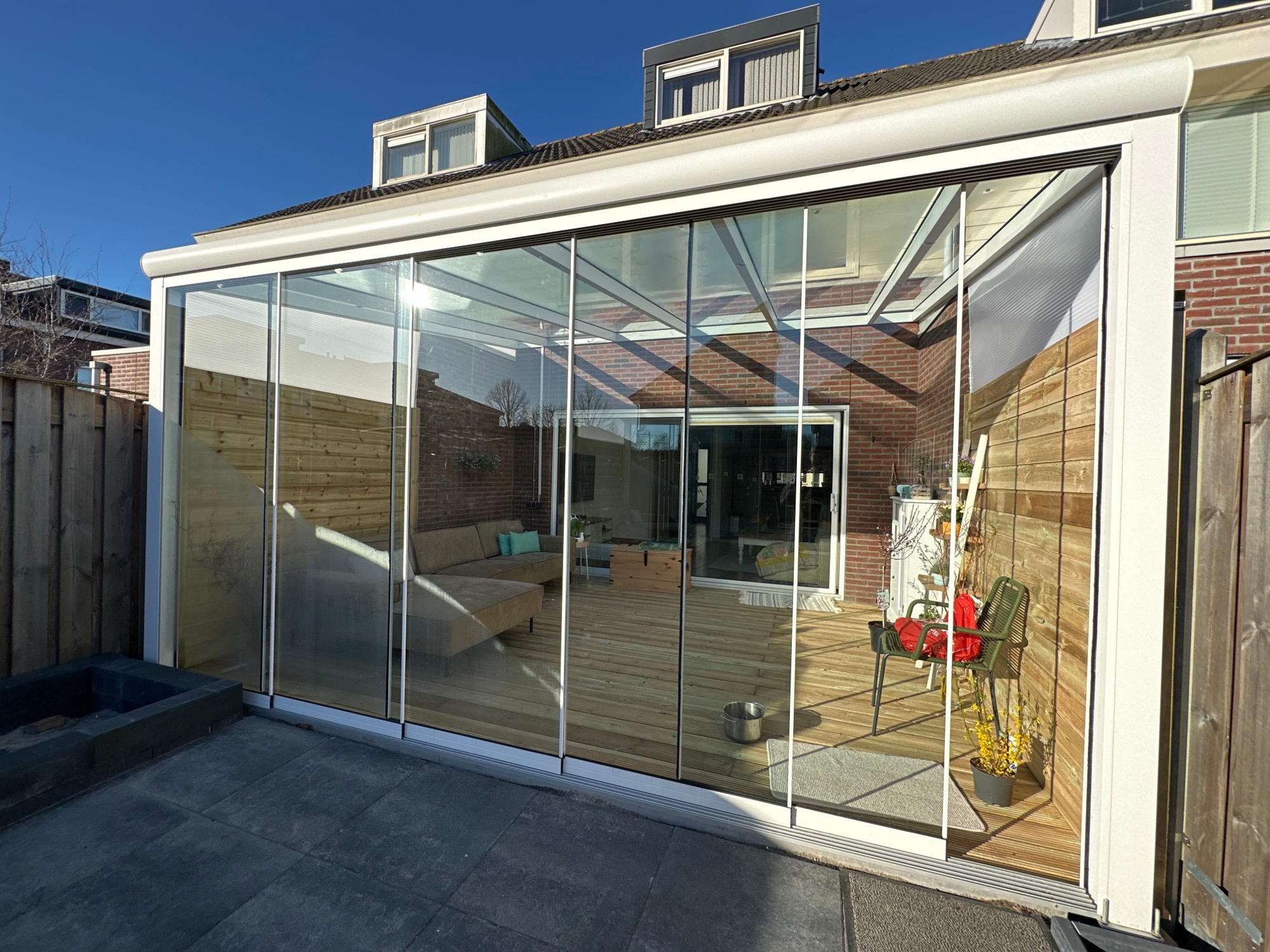 Glazen aanbouw / serre tegen woning, Zeist